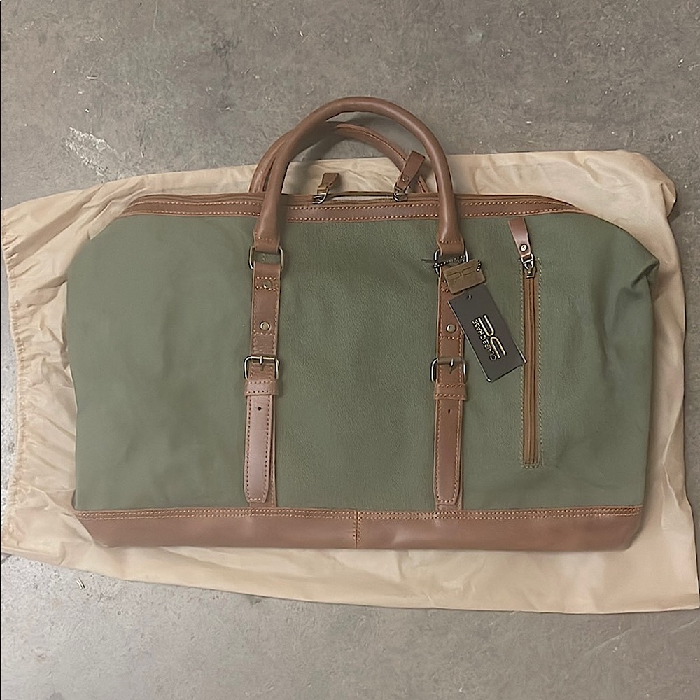 Claire Chase Green Duffel Bag with Leather Handles and Spacious Design